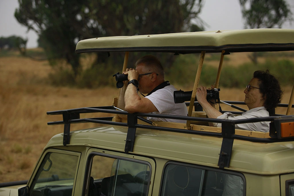 4x4-safari-landcruiser-jeep-interior-Uganda-safari-tour-packages-by-Choose-Uganda-Safaris-scaled